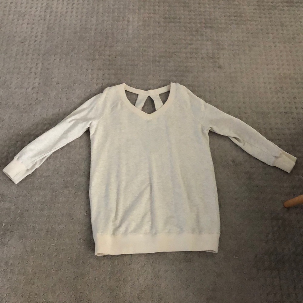 Long comfortable cut out sweatshirt.